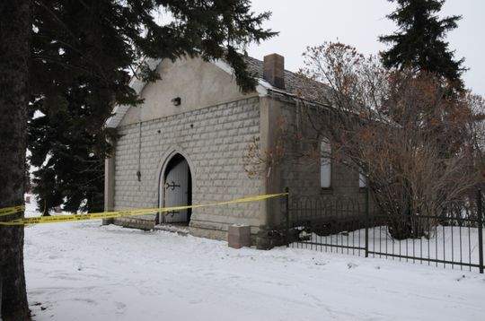 An old chapel in Calgary’s Union Cemetery is taped off after a deliberately set fire.