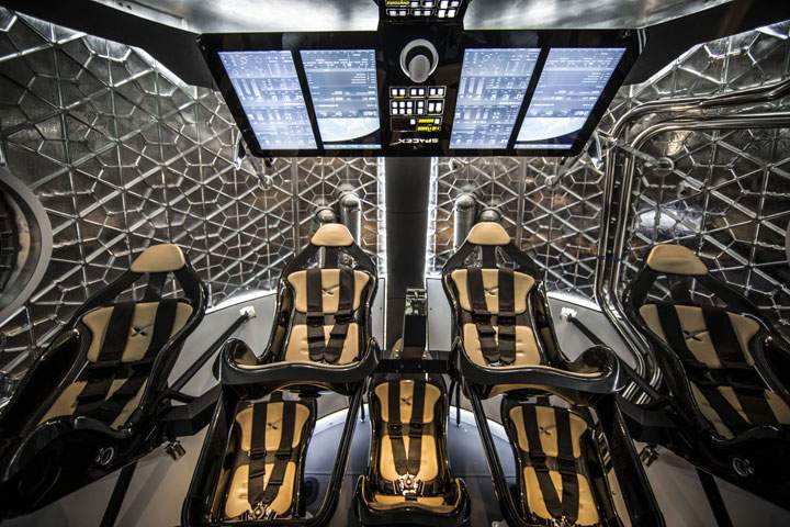 The sleek, modern interior of the Dragon V2.