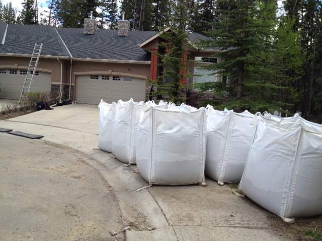 Nervous homeowners take flood mitigation efforts into their own hands - image