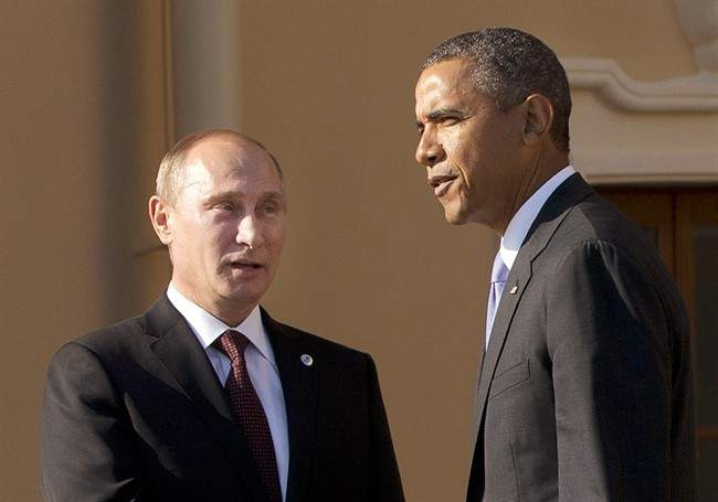 In this Sept. 5, 2013 file photo, President Barack Obama shakes hands with Russian President Vladimir Putin during arrivals for the G-20 summit at the Konstantin Palace in St. Petersburg, Russia, Thursday, Sept. 5, 2013. 