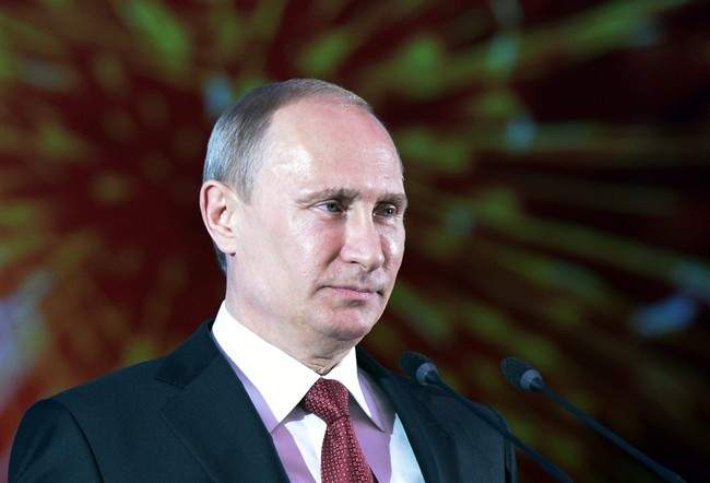Russian President Vladimir Putin speaks at a reception marking Victory Day in the Kremlin in Moscow, Russia, Thursday, May 8, 2014. 
