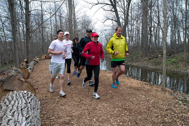 Ontario Premier Kathleen Wynne leads a group of runners in Milton, Ontario on Monday May 5, 2014.