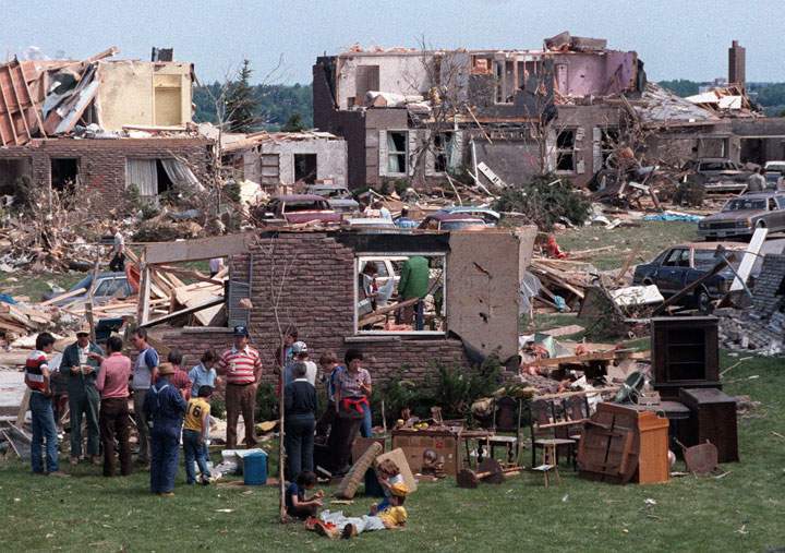 Neighbours and volunteers take time out for lunch on June 2, 1985 as clean-up efforts begin in Barrie following a major tornado.