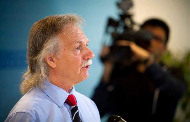 British Columbia Teachers' Federation President Jim Iker announces a full-scale strike for school teachers is set for Tuesday, June 17 during a press conference in Vancouver, B.C., on Thursday June 12, 2014. THE CANADIAN PRESS/Ben Nelms.