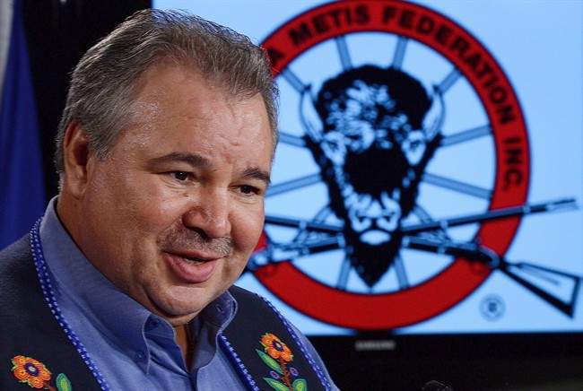 David Chartrand, president of the Manitoba Metis Federation, takes part in a press conference on Parliament Hill in Ottawa on Friday March 8, 2013.