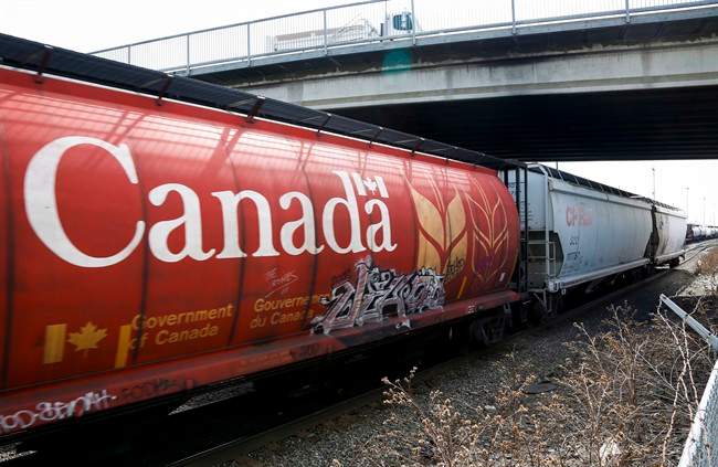 [File Photo] Crews cleaning up after 24 cars derail on Canadian Pacific Railway train west of Moose Jaw, Sask.