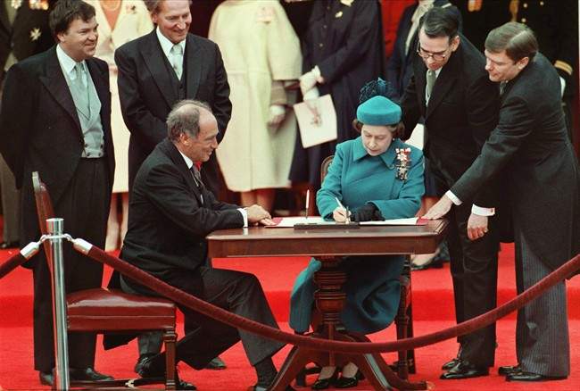 The Queen signs Canada’s constitutional proclamation in Ottawa on April 17, 1982 as Prime Minister Pierre Trudeau looks on. With the stroke of a pen by the Queen in Ottawa, Canada had its own Constitution, one of the many notable dates in the history of the country. Canada marks its 147th birthday July 1.