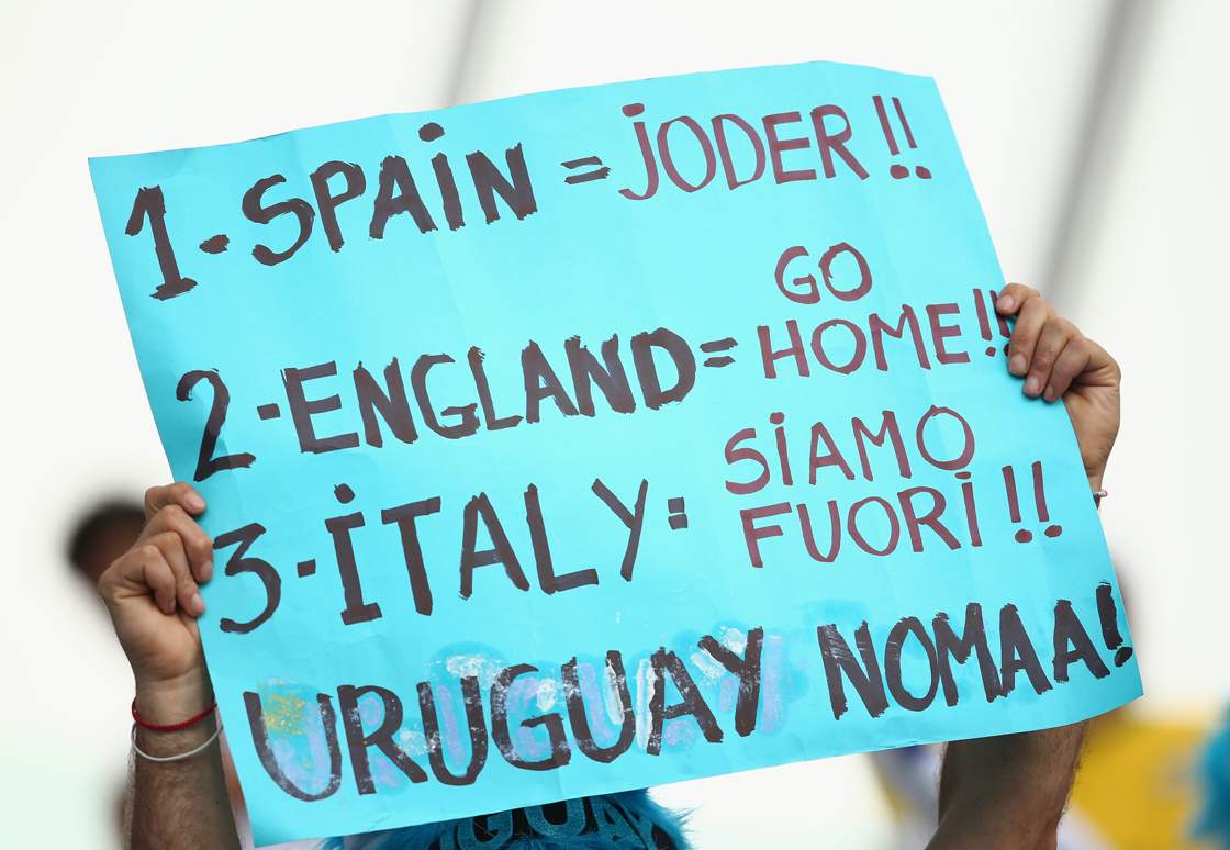 NATAL, BRAZIL - JUNE 24: A fan holds up a banner during the 2014 FIFA World Cup Brazil Group D match between Italy and Uruguay at Estadio das Dunas on June 24, 2014 in Natal, Brazil. (Photo by Julian Finney/Getty Images)