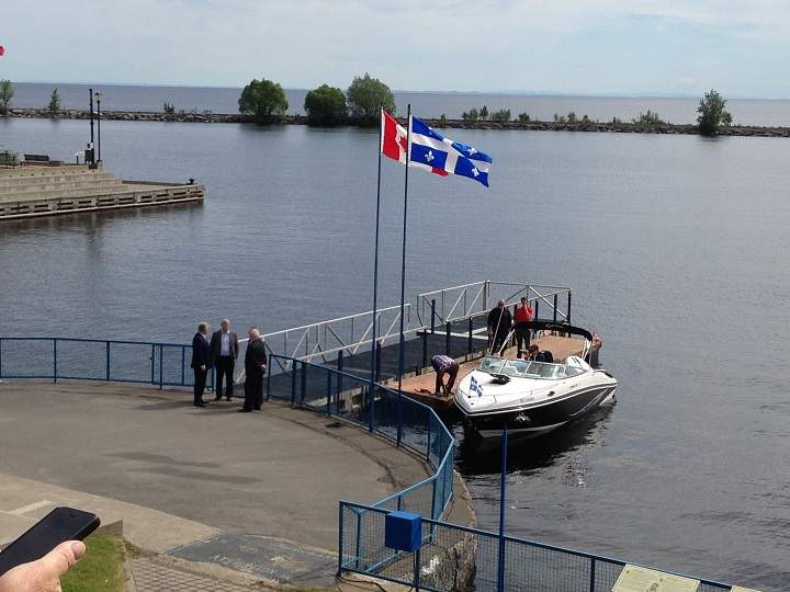 Prime Minister Stephen Harper arrived in Roberval, Que. by boat on June 25, 2014.