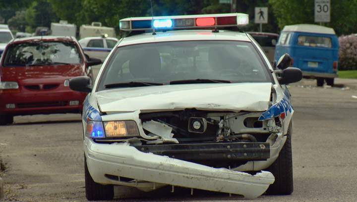 Driver arrested after stolen truck rams Saskatoon police cruiser, collides with several vehicles during afternoon rush hour.