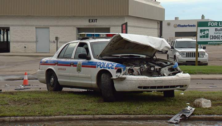 Driver arrested after stolen truck rams Saskatoon police cruiser, collides with several vehicles during afternoon rush hour.