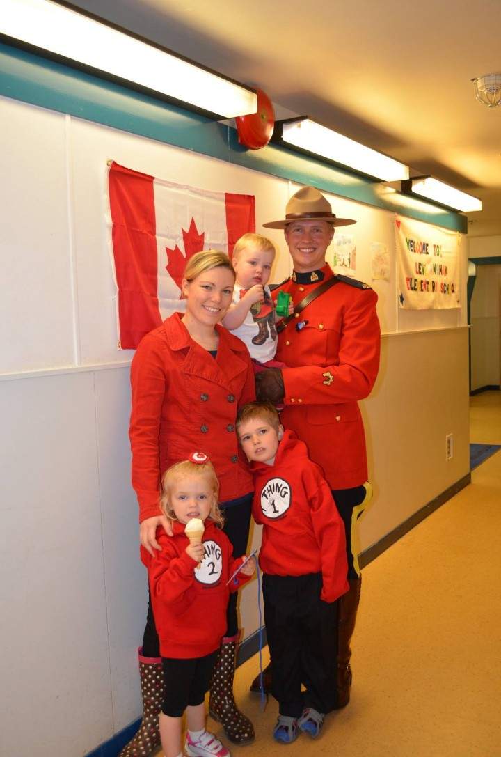 Krysta Erickson is pictured above with her husband Allan, daughter Scarlette, son Emerson and baby Everett.