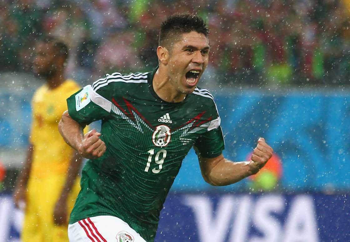 Oribe Peralta of Mexico celebrates his goal in the second half against Cameroon. Mexico won 1-0.