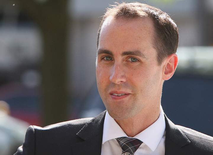Defendant Michael Sona walks to the courthouse in Guelph, ON, Wednesday, June 4, 2014, the the Robocalls trial.