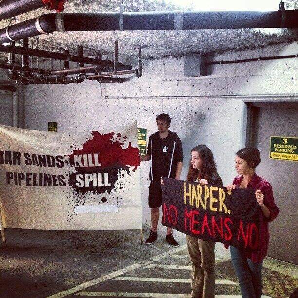 Protest at James Moore's office.