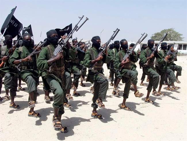 Hundreds of newly trained al-Shabab fighters, above, in 2011.
