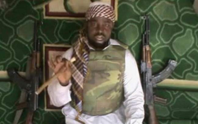 This file image made available from Wednesday, Jan. 10, 2012, taken from video posted by Boko Haram sympathizers shows Imam Abubakar Shekau, the leader of the radical Islamist sect. 