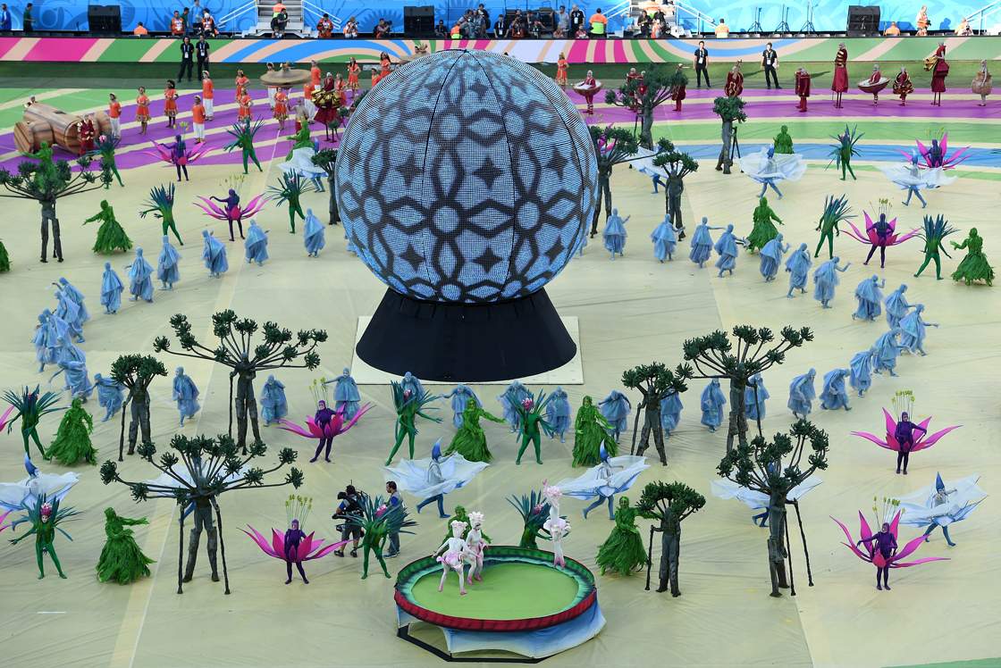 Performers take part in the opening ceremony of the 2014 FIFA World Cup at the Corinthians Arena in Sao Paulo on June 12, 2014. AFP PHOTO / FABRICE COFFRINI (Photo credit should read FABRICE COFFRINI/AFP/Getty Images)