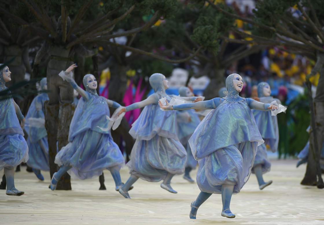 Performers take part in the opening ceremony of the 2014 FIFA World Cup at the Corinthians Arena in Sao Paulo on June 12, 2014. AFP PHOTO / FABRICE COFFRINI (Photo credit should read FABRICE COFFRINI/AFP/Getty Images)