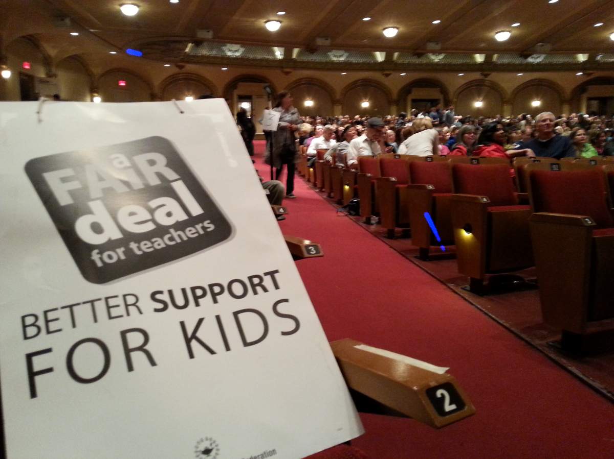 Elementary school teachers meeting inside Orpheum Theatre in Vancouver.
