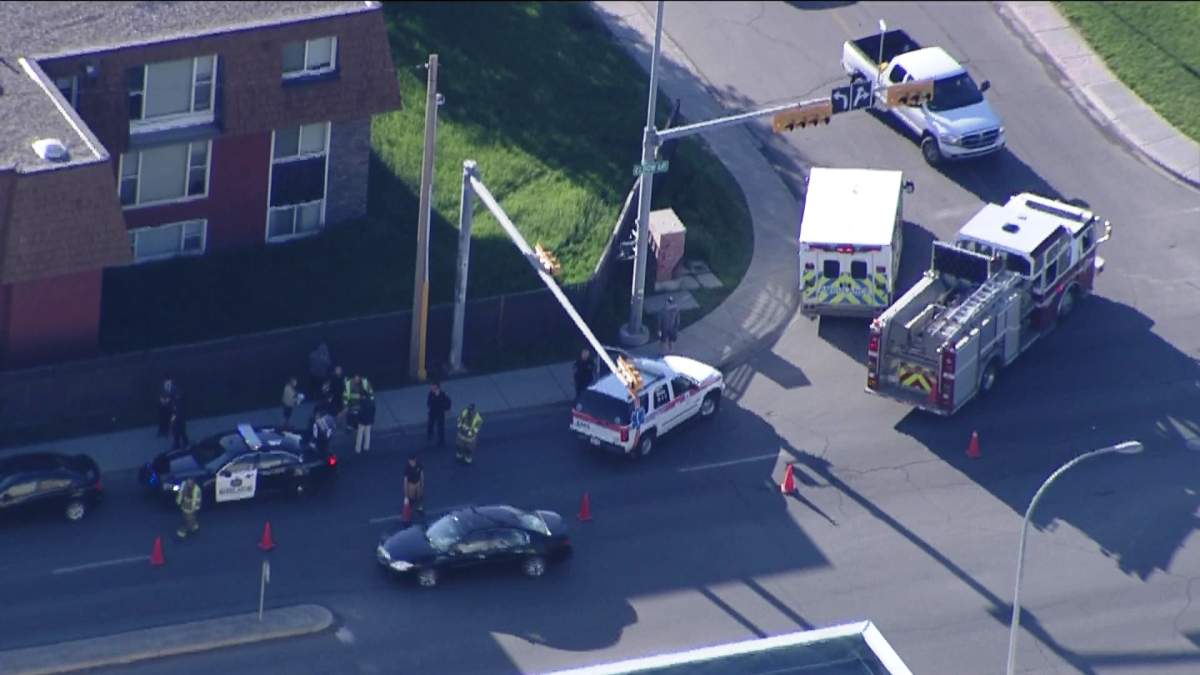 Emergency crews rush to the scene of crash in the area of Elbow Drive and 68th Avenue S.W. on Wednesday, June 04, 2014.