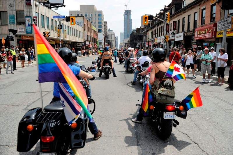 Dykes on Bikes at the Dyke March during Pride, Toronto, Ont., June 29, 2013. THE CANADIAN PRESS IMAGES/Dominic Chan