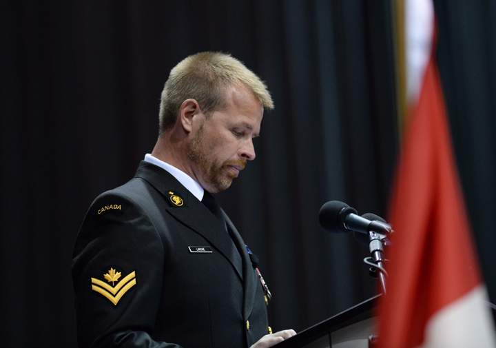 Daniel Larche, a master seaman in the Royal Canadian Navy, speaks of the bond he shared with his brother, slain RCMP Const. Douglas James Larche, during his eulogy at the RCMP regimental funeral on Tuesday, June 10, 2014.