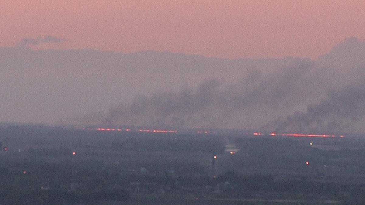 A grass fire spreads through a field in the Manitoba rural municipality of Rockwood on Tuesday.