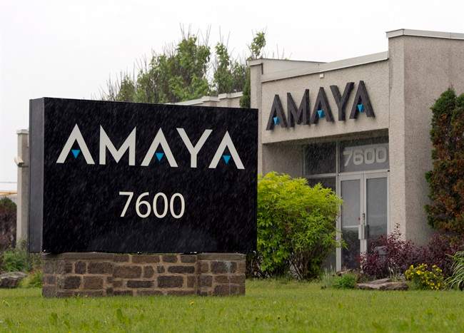 The Amaya Gaming Group headquarters are seen Friday, June 13, 2014 in Montreal. The company has acquired Pokerstars and Full Tilt Poker for $4.9 billion.