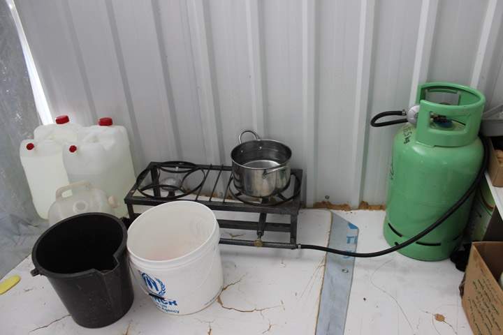 A stove inside a refugee shelter in Azraq Camp