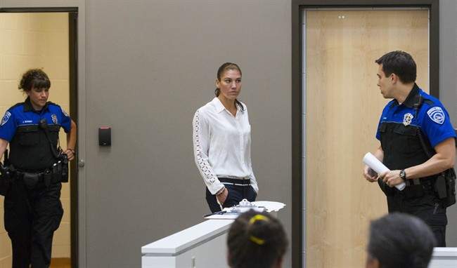 U.S. women's soccer team goalkeeper Hope Solo appears in Kirkland Municipal Court on Monday, June 23, 2014, in connection with her domestic violence arrest at her sister's home in Kirkland, Wash.