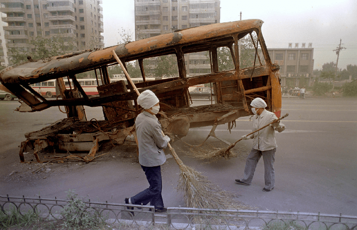 Jeff Widener’s photo of a burned out bus in Beijing in June 1989, when the government cracked down on pro-democracy protesters in Tiananmen Square.