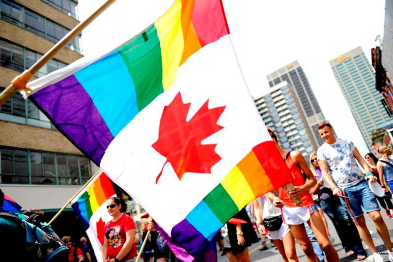 A Canadian flag seen at the Dyke March in downtown Toronto, Ont., June 29, 2013. THE CANADIAN PRESS IMAGES/Dominic Chan.