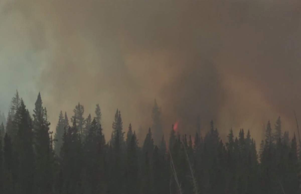 The Spreading Creek wildfire, which burned 1.5 km off the David Thompson highway on the way into Banff National Park, July 11, 2014