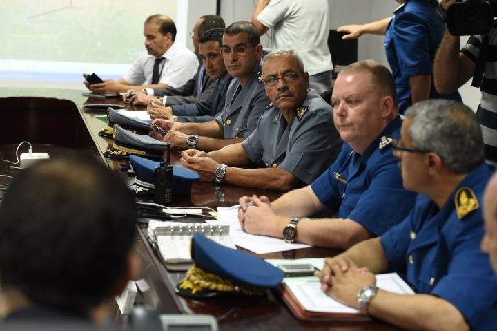 An Algerian crisis unit meets at the Houari-Boumediene International Airport in Algiers on July 24, 2014 following the disappearance of an Air Algerie plane over Mali. An Air Algerie plane missing since early July 24 over Mali with 116 passengers and crew, including 50 French nationals, on board probably crashed, French Foreign Minister Laurent Fabius said.