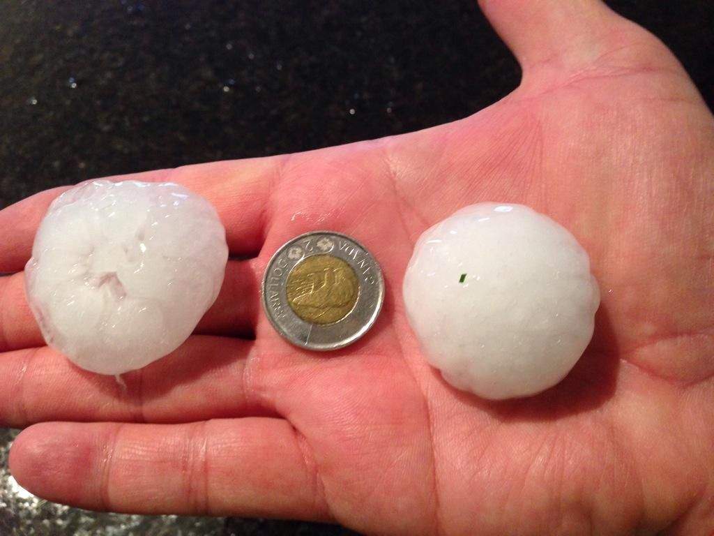 Huge hailstones shattered windows and shredded siding on homes in Airdrie on August 8. 2014.