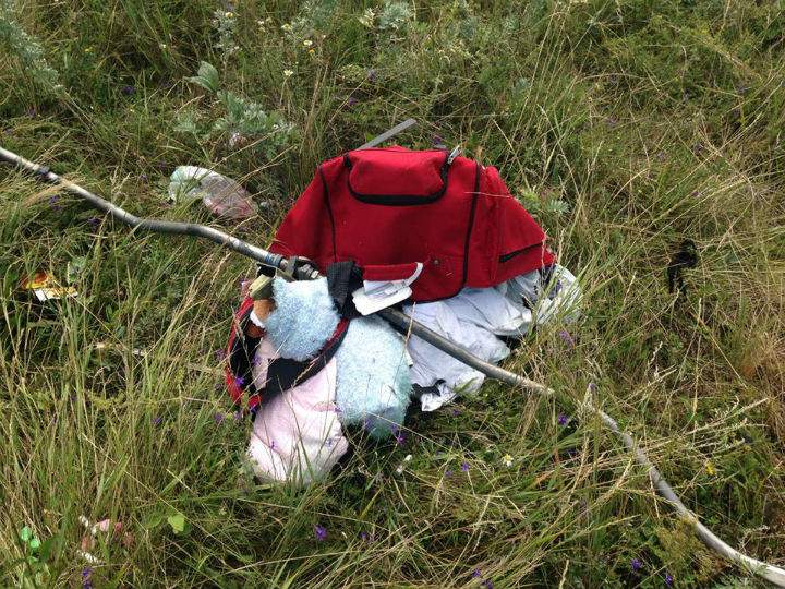 Personal effects near the wreckage from Malaysia Airlines Flight MH17