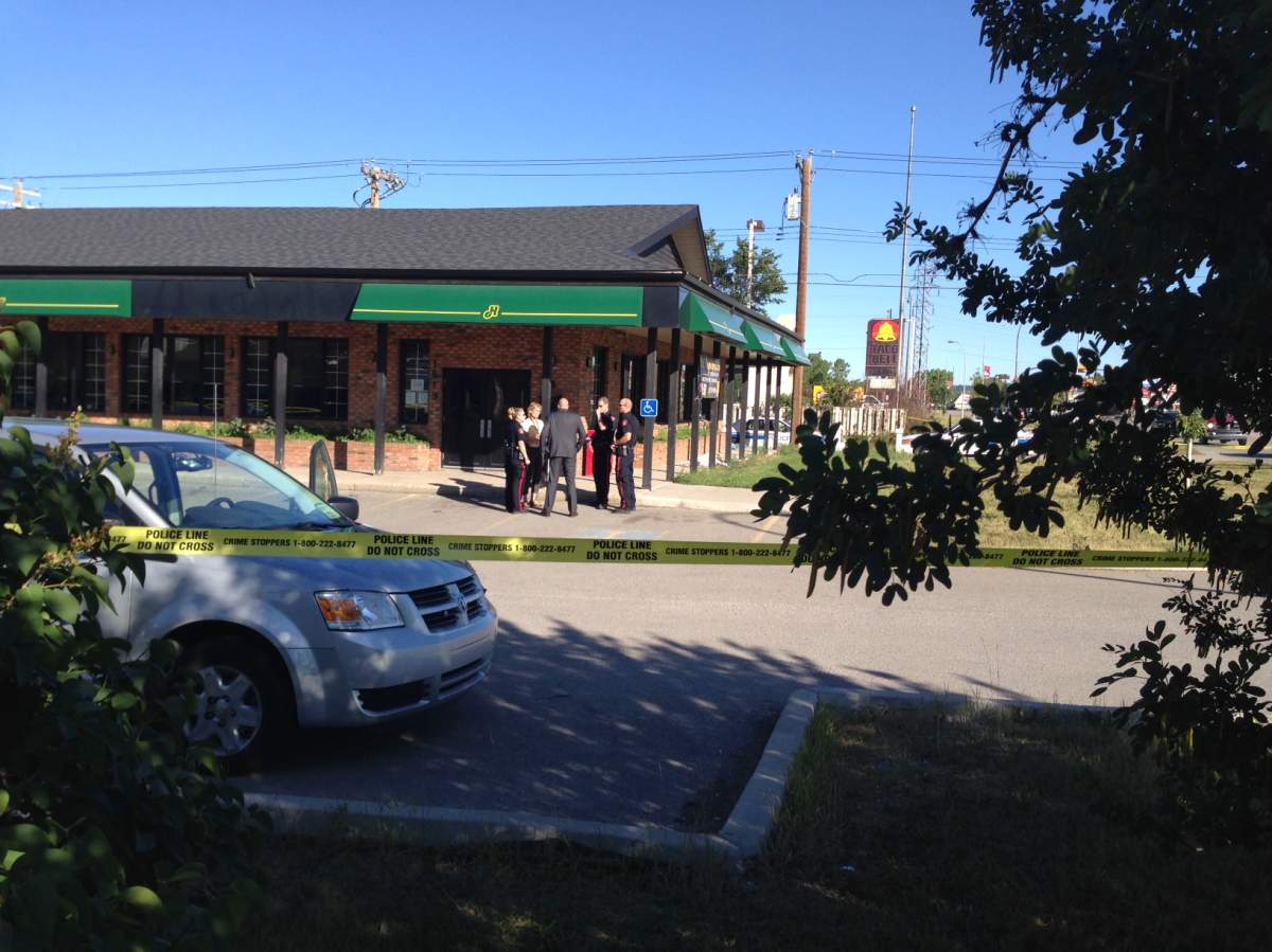 Police tape off a Humpty's in the 1600 block of 46th Street N.W. on Thursday, July 24th, 2014.