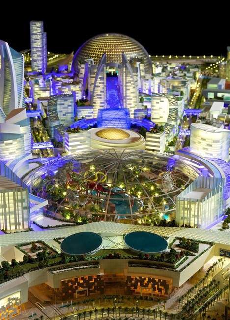 This image provided by Dubai Holding on Saturday July 5, 2014, shows an artist rendition of their planned Mall of the World project that will include an 8 million square foot (743,224 square meter) mall, a climate-controlled street network, a theme park covered during the scorching summer months and 100 hotels and serviced apartments. Dubai Holding, a conglomerate controlled by the emirate\’s ruler, is developing the complex. It gave no details on the cost or the completion date.