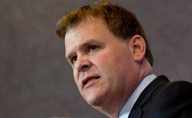 Foreign Affairs Minister John Baird responds to a question at a news conference Friday, May 2, 2014 in Ottawa.