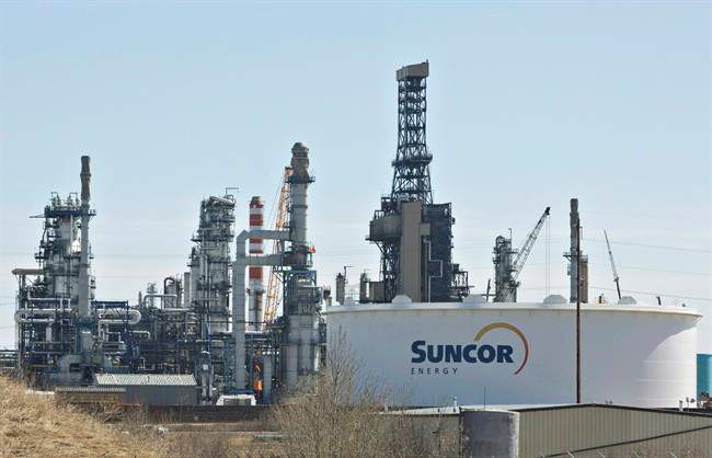 Suncor Energy Inc. (TSX:SU) is reducing its workforce
by 1,000 and cutting $1 billion from its capital budget in response
to plummeting crude oil prices.
