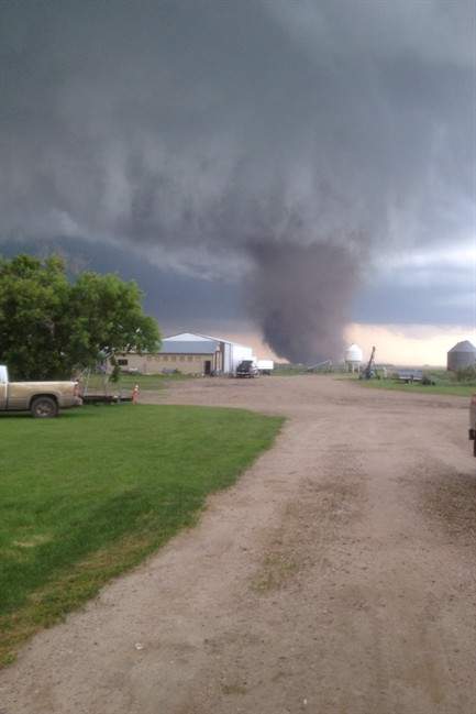 A tornado touches down near Outlook, Sask., on Saturday, July 5, 2014.