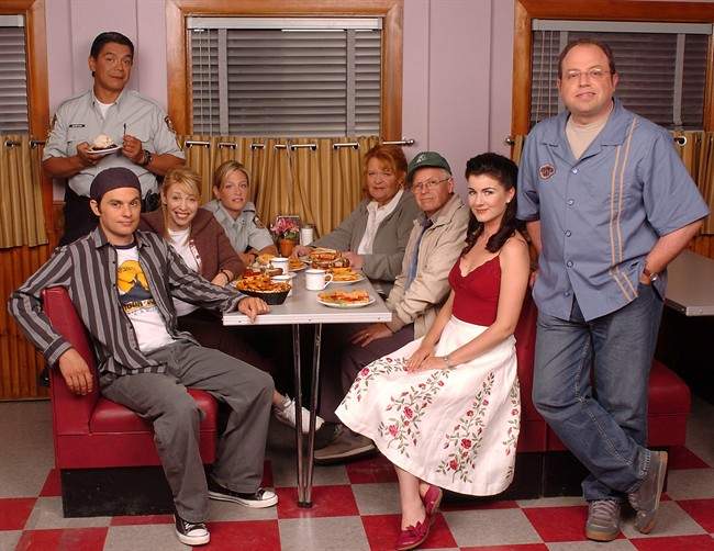 The cast of “Corner Gas: The Movie” poses on the set of the movie in Saskatchewan.