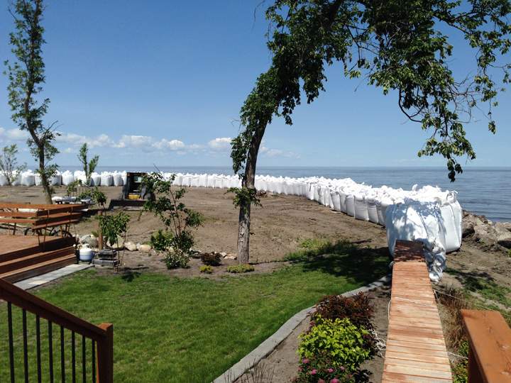A summer home is prepared for possible flooding at Delta Beach on the shores of Lake Manitoba at the outlet of the Portage Diversion.