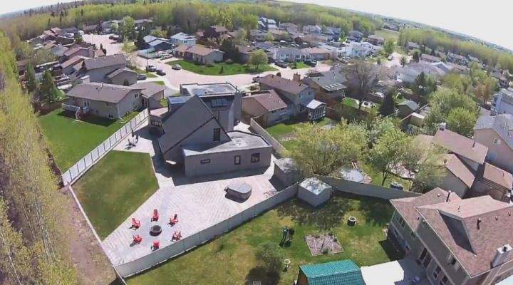 A drone captures video footage from above Fort McMurray, AB.
