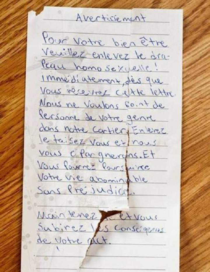 A threatening homophobic note allegedly left on the door of a Longueuil family on July 27, 2014.