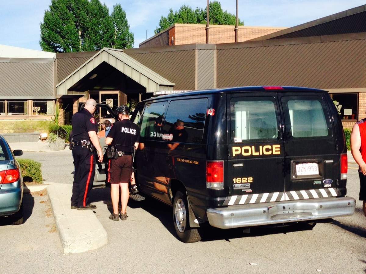 Police arrest one man at the Calgary Jewish Centre.