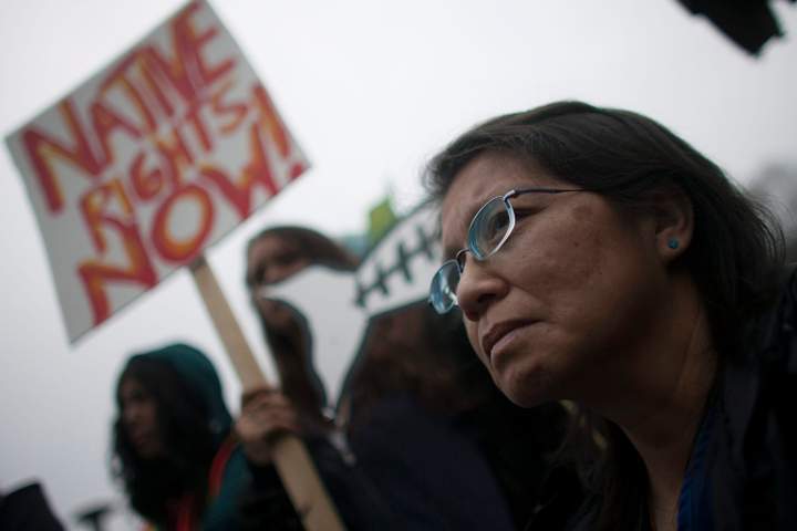 April 7, 2010 - GRASSY NARROWS PROTEST - Hundreds of natives, many who travelled all the way from Grassy Narrows, and many other support groups marched through Toronto's downtown to the front lawn of Queen's Park on Wednesday to protest 40 years of mercury poisoning in their water.