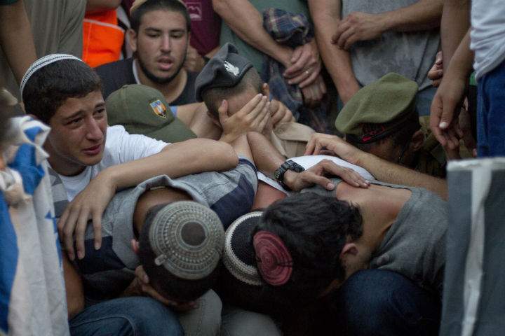 Thousands of people mourned murdered Israeli teens Eyal Yifrah, Gilad Shaar and Naftali Fraenkel