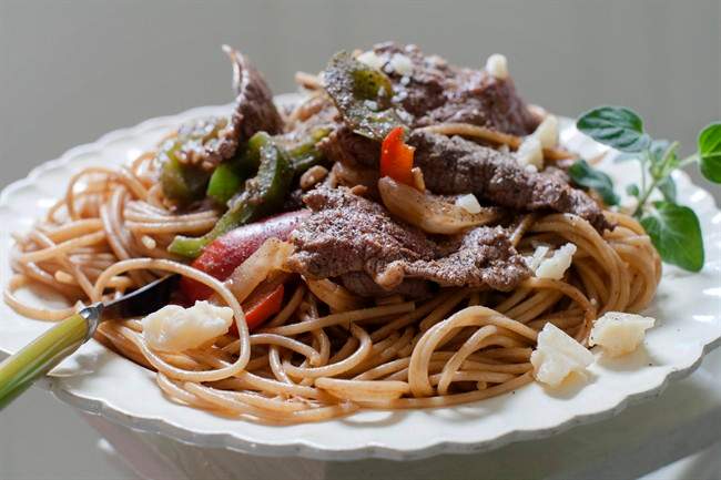 Steak and cheese grinder recast as a pasta dinner